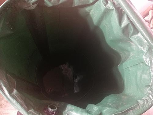 Deposito de agua flexible para mezclas
